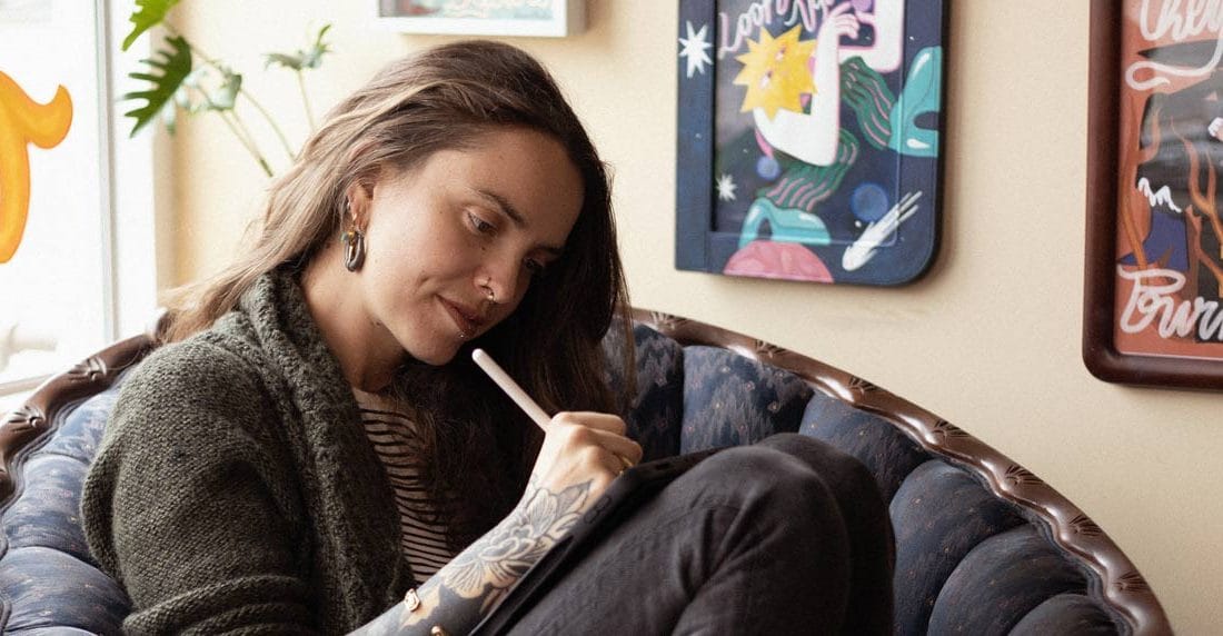 Andrea drawing in her studio