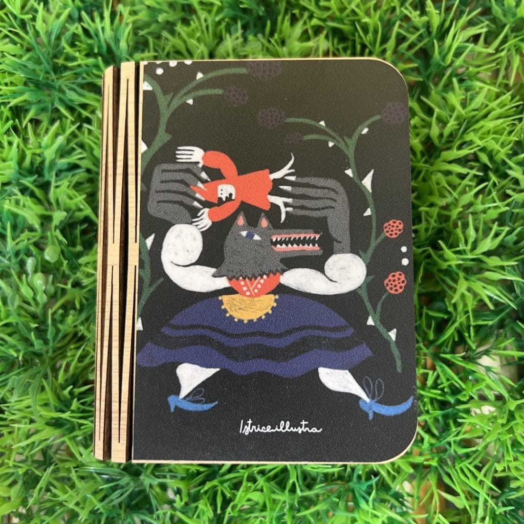 Book lamp- small- Asturian dancers · Lámpara libro ilustrada de Istrice Illustration